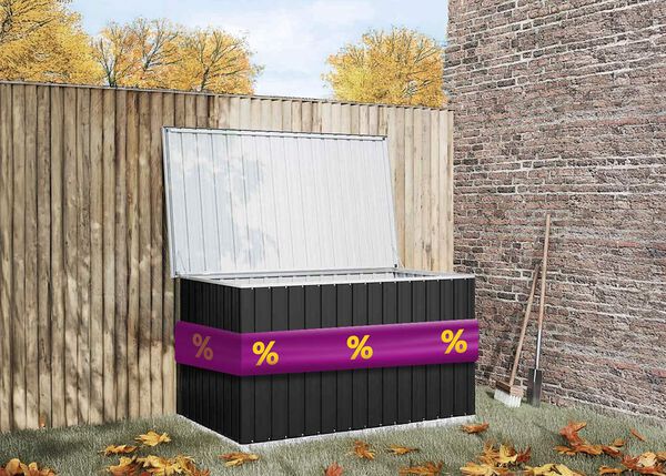 Black outdoor storage box with an open lid and purple ribbon showing discount icons, in a garden setting.