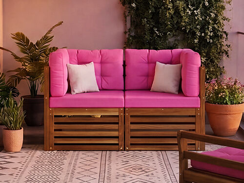New modular balcony sofa set with bold pink cushions and solid wood frame, styled on a city balcony with plants and a glass railing, NEW badge displayed