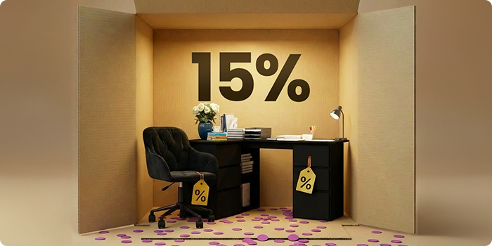 Home office furniture with a black desk, black drawer unit and black office chair styled in a box scene, showcasing a 15% discount on office furniture.