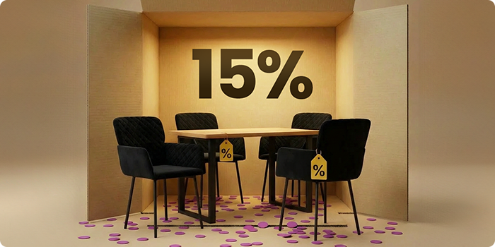 Dining table with black upholstered chairs arranged in a box-style interior, highlighting a 15% discount on dining room furniture.